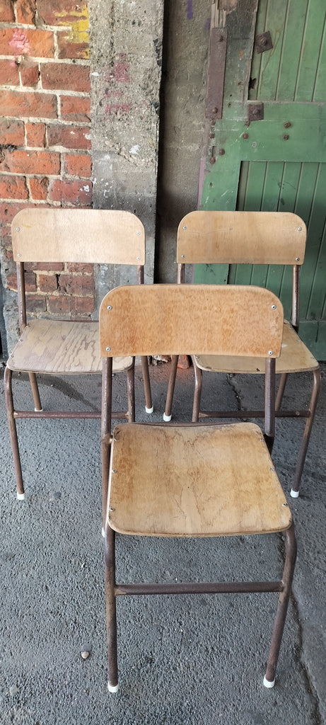 Stackable old High School Chairs .