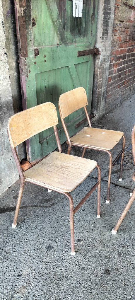 Stackable old High School Chairs .